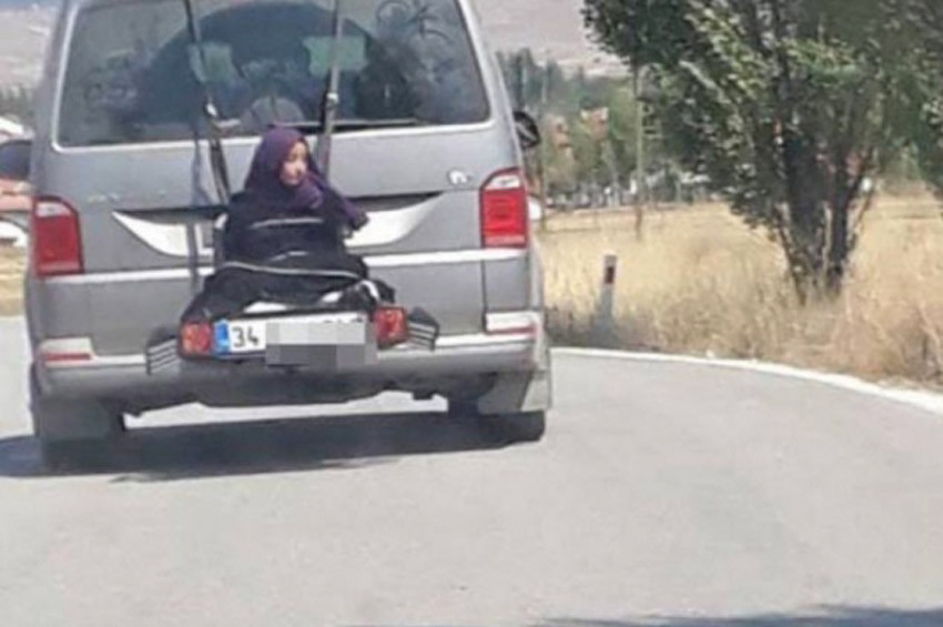 Minibüsün arkasına bağlanıp taşınan kadının görüntüsü